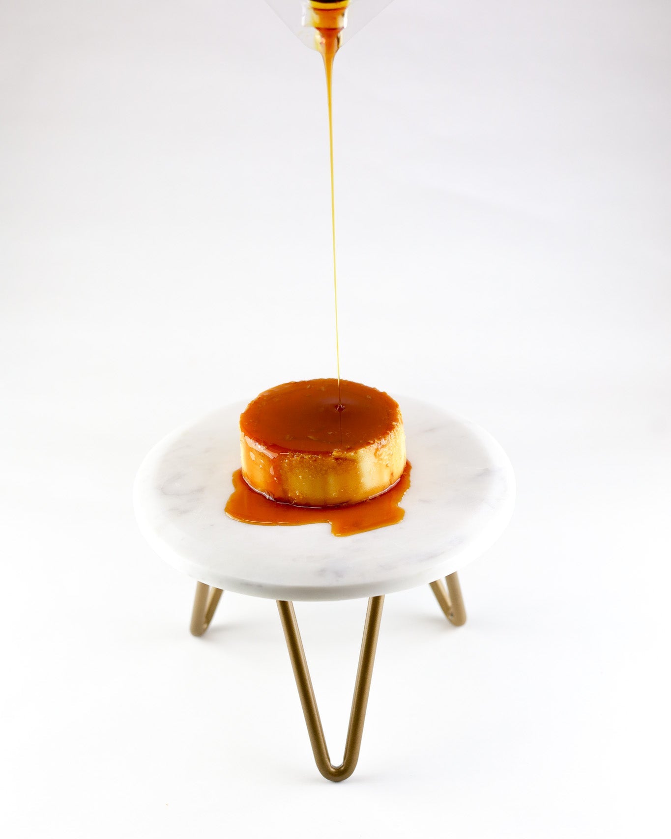 Silky flan topped with golden caramel — fresh Latin dessert from Shelíss Bakeshop.
