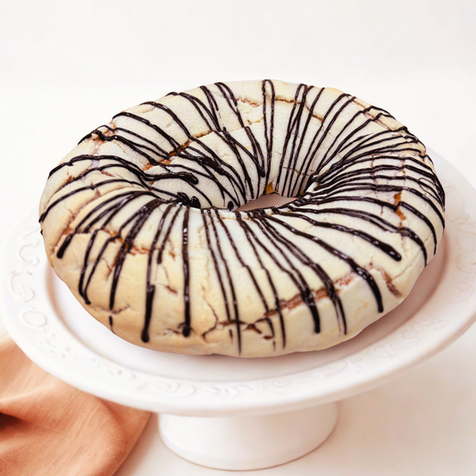 Rosca de Reyes filled with cream cheese and raspberry jam